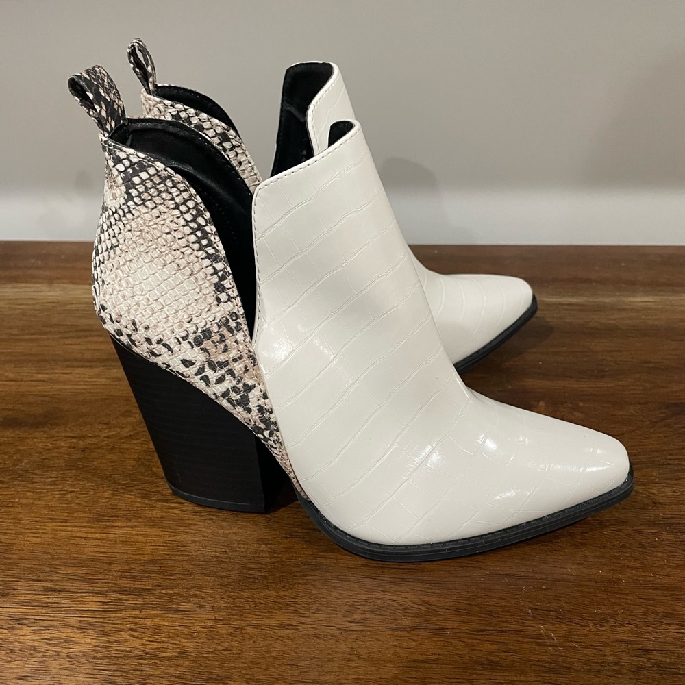White/snakeskin booties